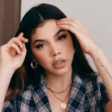 Escuchar Canciones de Kenia Os